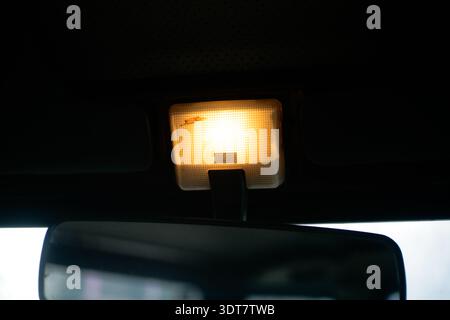 close up view of car interior dome light Stock Photo