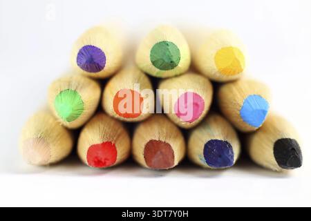 Vividly arranged colorful pencils on a surface Stock Photo