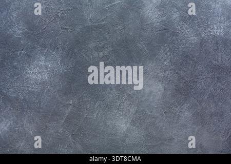 Gray Textured Wall Surface With Subtle Patterns and Tonal Variations Across the Area Stock Photo