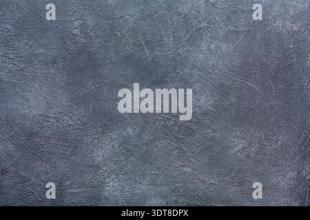 Gray Textured Wall With Subtle Patterns and Uneven Surface Details in Natural Light Stock Photo