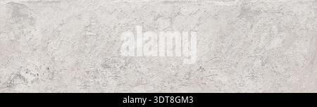 Rough gray concrete surface with natural light creating a textured grunge background Stock Photo