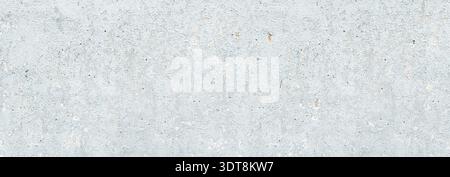 Light grey weathered concrete texture showing a rough urban wall background with blemishes Stock Photo