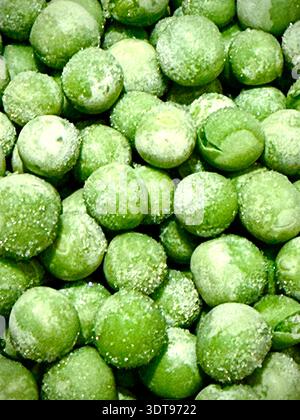 Frozen petit pois (baby peas) close-up Stock Photo