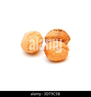 Three walnuts isolated on white background. Stock Photo