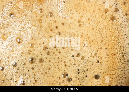 Brown and gold coffee bubbles texture for culinary background Stock Photo