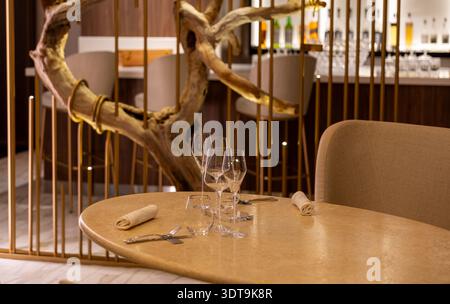Elegant Restaurant Interior With Set Dining Table Wine Glass And Modern Luxury Decor Stock Photo