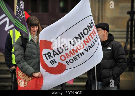 ALLOA, SCOTLAND – February 21st, 2026: Protesters seen getting ready for march.  Protesters gather and march from Alloa Town Hall to Forth Valley College Alloa Campus during the "March for Alloa Campus" rally. The event, supported by EIS (Educational Institute of Scotland), GMB, and UNISON unions, opposes potential campus closure amid severe Scottish further education funding cuts and rising costs. Speakers included FVC Principal Kenny MacInnes, MSPs Keith Brown and Richard Leonard, MP Brian Leishman, and union representatives. Stock Photo