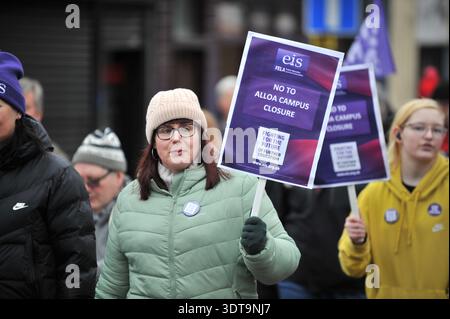ALLOA, SCOTLAND – February 21st, 2026: Protesters seen holding placards during march.  Protesters gather and march from Alloa Town Hall to Forth Valley College Alloa Campus during the "March for Alloa Campus" rally. The event, supported by EIS (Educational Institute of Scotland), GMB, and UNISON unions, opposes potential campus closure amid severe Scottish further education funding cuts and rising costs. Speakers included FVC Principal Kenny MacInnes, MSPs Keith Brown and Richard Leonard, MP Brian Leishman, and union representatives. Stock Photo