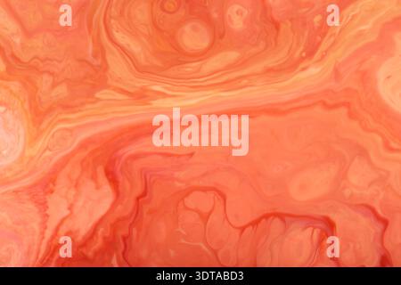 Abstract coral orange marble swirl pattern with fluid movement for creative background Stock Photo