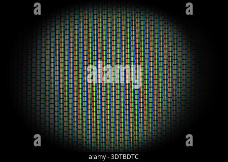 Analog TV Screen Close Up Texture. RGB dots seamless pattern, revealing digital display structure through vibrant red, green, blue color fragments Stock Photo