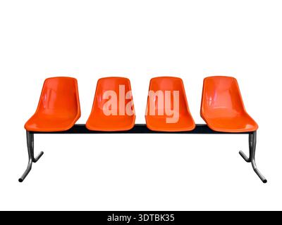 Row of red plastic chairs isolated on white with clipping path included. Conference room chairs Stock Photo