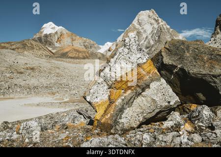 Colorful stunning beautiful rock formations form in high altitude Himalayas mountains. Close up EBC trekking detour route to Gokyo Ri through Chola pa Stock Photo