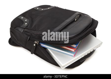 Backpack with a laptop and books on white background Stock Photo