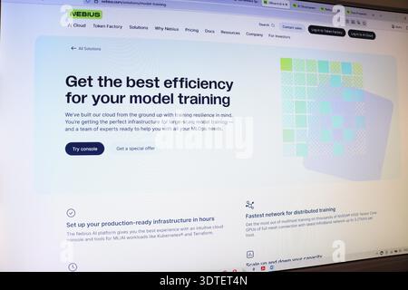 Computer monitor showing website for artificial intelligence cloud services. Editorial image depicting modern technology and digital interface for mod Stock Photo