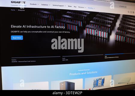 Computer screen displaying a website about artificial intelligence infrastructure. Web page with information on Al factory development. Digital techno Stock Photo