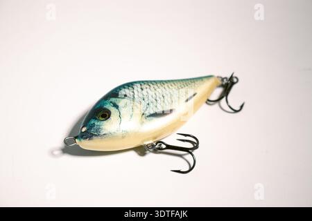 Fishing accessories bobbers, hooks, tackles, baits isolated on white background. Image for shop for fisherman. Close up Stock Photo