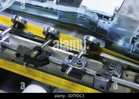 Equipment for the processing of paper in a modern printing house Stock Photo
