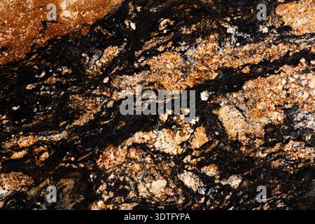 Stylish Black Sedna - granite background, texture in elegant dark colors as part of your design. Stock Photo