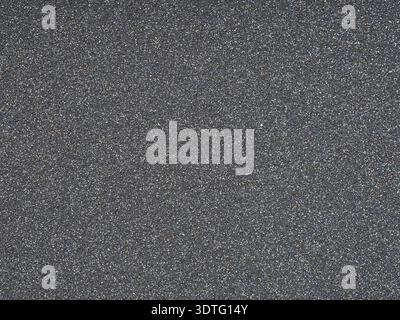 Dark grey glitter texture closeup. Design pattern of holographic sparkling shiny glitter for decoration and design of unusual, extravagant Christmas Stock Photo