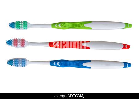 three toothbrushes on a white background Stock Photo