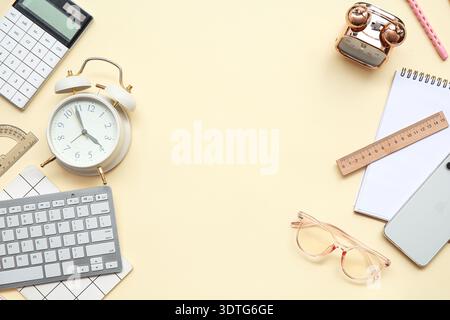 Composition with different stationery, modern gadgets and alarm clocks on color background Stock Photo