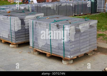 wholesale of building materials on the street, sale of cobblestones on the street Stock Photo