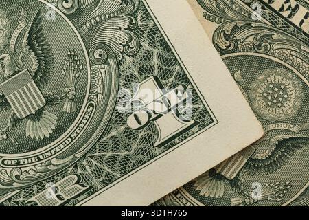 Fragments of one-dollar bills in close-up. Macro photograph. Stock Photo