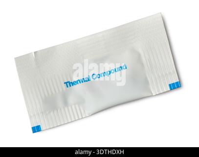 sealed white plastic thermal compound packet isolated white background, blue printed text on mockup template, top view with shadows Stock Photo
