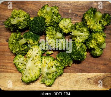 Vegetarian food. Broccoli on counter highlights vibrant color and ...