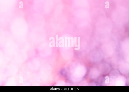Soft Pastel Pink and Purple Abstract Bokeh Background featuring out-of-focus bokeh lights in soft pastel pink, lilac, and lavender Stock Photo