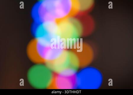 Abstract Vibrant Multi-Colored Bokeh Lights Background A creative and colorful abstract shot featuring out-of-focus light Stock Photo