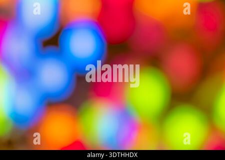 Abstract Vibrant Multi-Colored Bokeh Lights Background A creative and colorful abstract shot featuring out-of-focus light Stock Photo