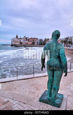 Sitges. Spain - February 22, 2026: Dona mediterrania sculpture by Lluisa Granero overlooking Sant Sebastia beach and Mediterranean Sea in coastal prom Stock Photo
