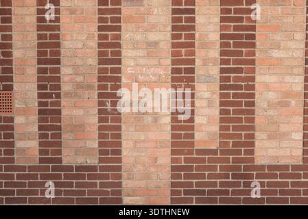 a brick wall using two different colour/colors brick,s to make the pattern wall uk Stock Photo