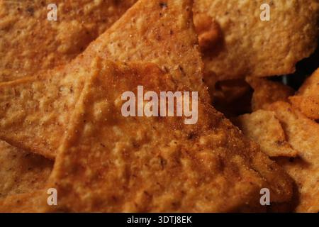 Macro Shot Of Crispy Tortilla Corn Nacho Chips Texture Stock Photo