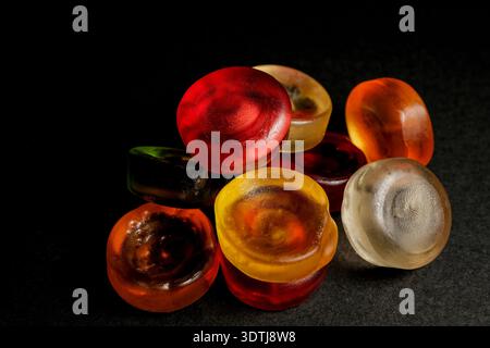 Macro Shot Of Assorted Colorful Gummy Gel Candies On Black Background Stock Photo