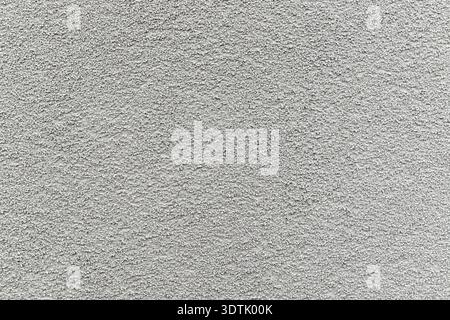 Textured gray roughcast plaster wall as background Stock Photo