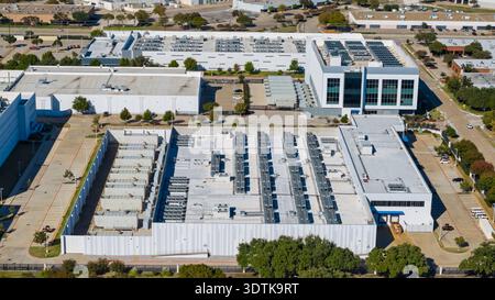 Richardson, Texas - November 16, 2025 : Aerial view showing large data center facilities with cooling units and industrial buildings Stock Photo