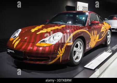 Stuttgart, Germany - December 7, 2025: Porsche 911 Carrera Coupe Biggibilla art car from 1998 displayed at the Porsche Museum in Stuttgart, featuring Stock Photo