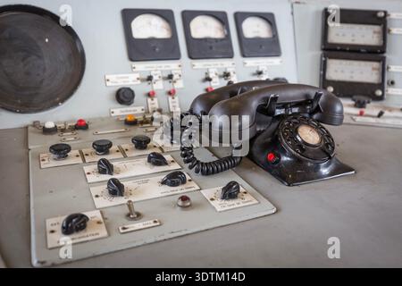 Vintage broadcast control panel with rotary telephone in Belgian TV transmission station VRT/RTBF-TV station, Wavre, Belgium Stock Photo