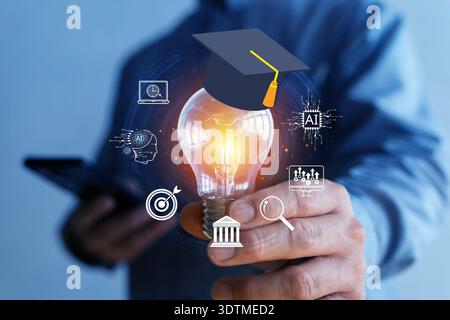 Close-up of a businessman holding a glowing light bulb with graduation cap and AI interface icons, representing edtech, digital learning, innovation, Stock Photo