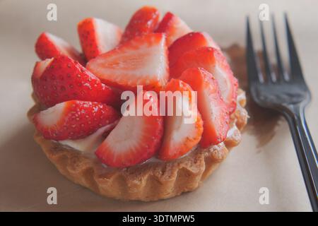 Strawberry tart with fresh fruits on a plate Stock Photo