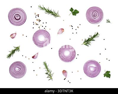 Sliced red onions set with spices and herbs isolated on white background.Top view Stock Photo