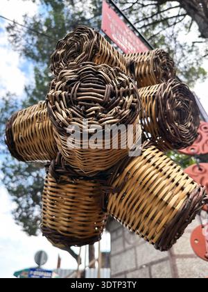 A few hanging wicker baskets Stock Photo