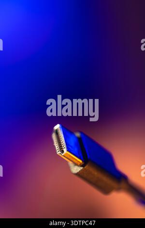 Hdmi connector with large copyspace area. Neon tech closeup. Stock Photo