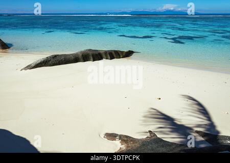 View From Famous Anse Source d'Argent To Mahe On A Sunny Day - Seen On La Digue Island, Seychelles Stock Photo