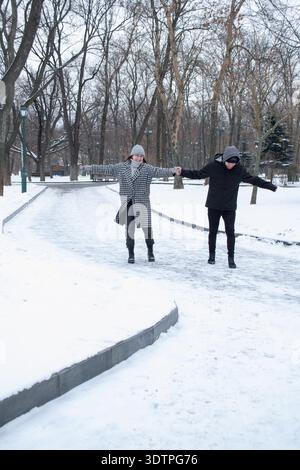 Young Couple Walking in Winter Stock Photo