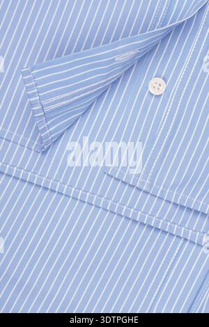 Striped Blue Shirt Fabric with Buttons and Plackets Close-Up Stock Photo