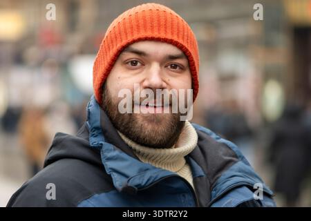35 year old man on city street in winter close up face Stock Photo