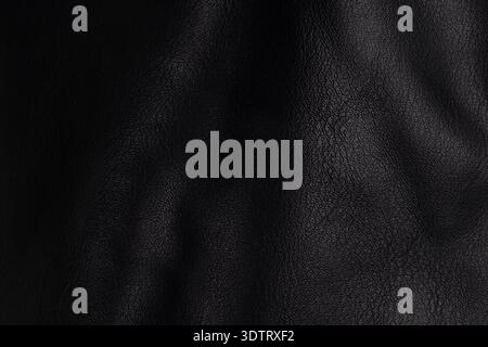 Dark black leather texture background close up Stock Photo